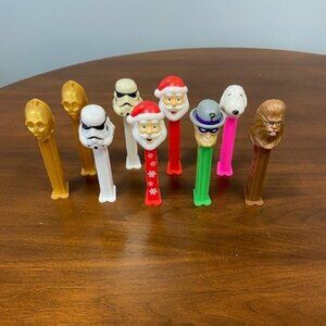 Assorted Pez dispensers - Star Wars, Snoopy, Santa Claus, and more